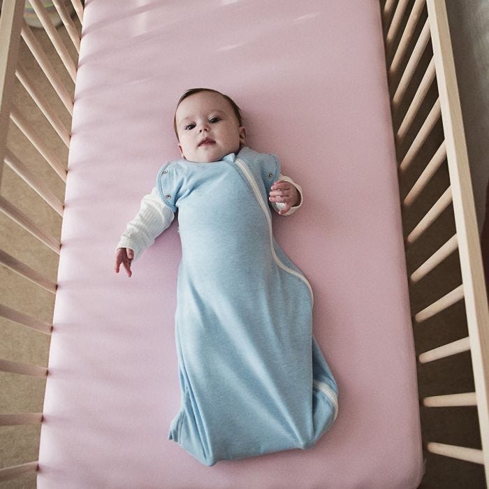 Baby sleeping in The Original Grobag Blue Marl Snuggle