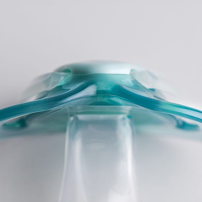 Close up of pacifier on a grey background