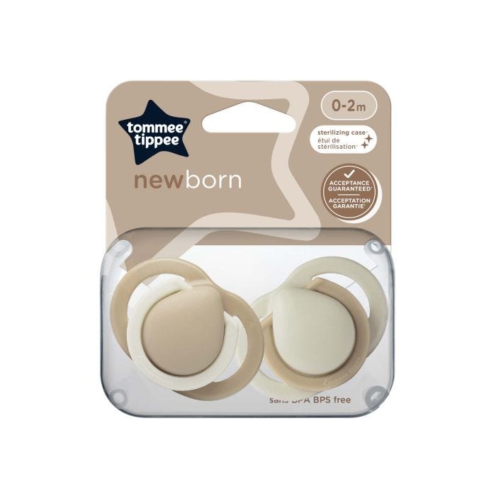 Pacifiers in packaging on a white background