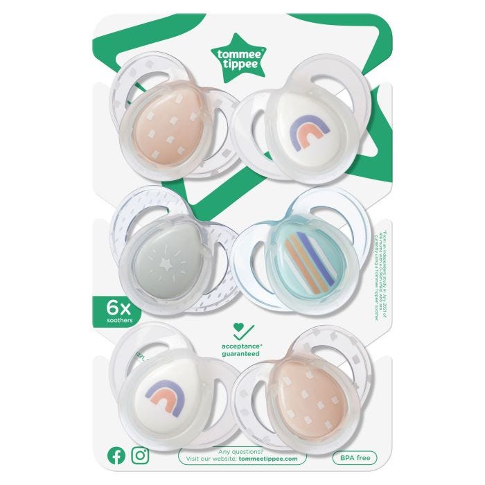 Soothers in packaging on a white background