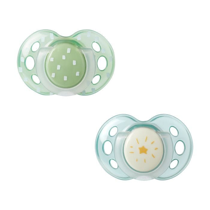 Pacifiers on a white background