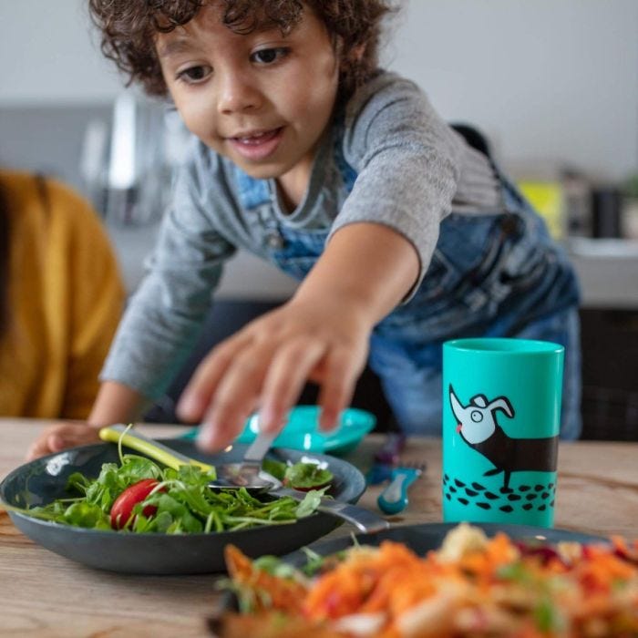 Childrens mealtime with a No Knock in foreground