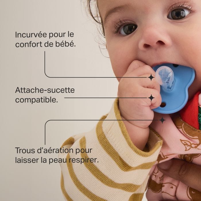 Image d&apos;un bébé portant une sucette à la bouche avec des indications sur les principales caractéristiques du produit