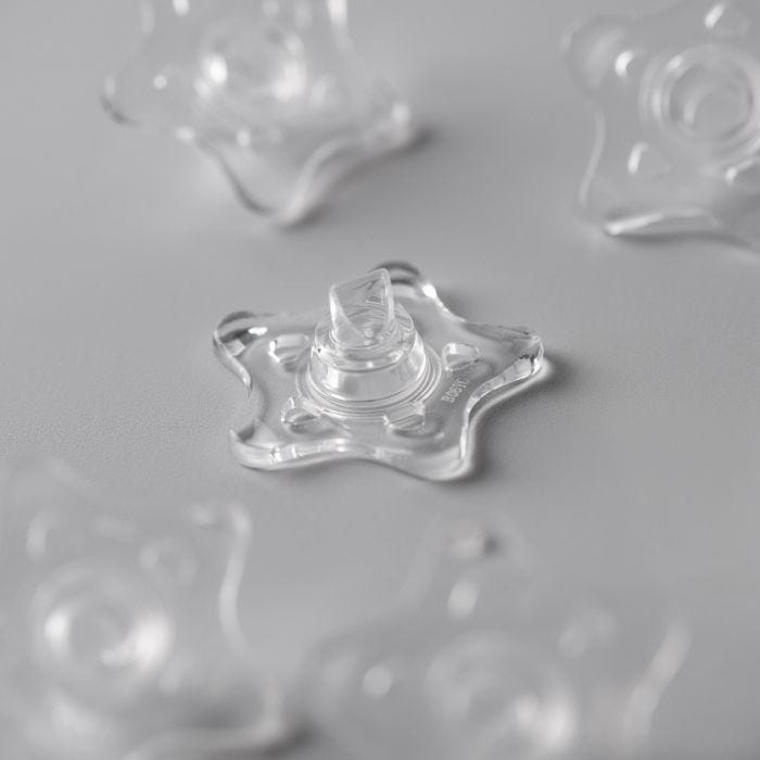 A silicone star valve for a Tommee Tippee Advanced Anti-Colic™ baby bottle.​