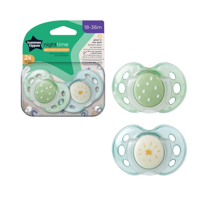 Pacifiers in packaging on a white background