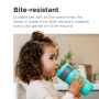Toddler drinking from the straw of her 3in1Cup with text about how it’s bite-resistant