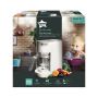 Quick-cook-baby-food-maker-packaging-with-claims-&apos;perfect-for-all-stages-of-baby&apos;s-development&apos;-and-image-of-toddler-spoon-feeding-himself-pureed-food