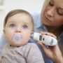 mother-taking-babys-temperature-using-digital-ear-thermometer