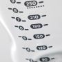 Close up of baby bottle’s measurement markers