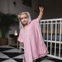 little-girl-standing-wearing-pink-penny-ponch-towel