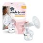 Tommee Tippee Manual Breast Pump with pink ergonomic handle on white background placed in front of its packaging.