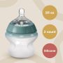 Silicone baby bottle on beige background with roundels stating 5fl oz, 2 count, silicone.