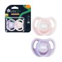 One pink and one purple ultralight pacifier next to packaging on a white background