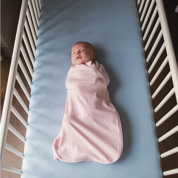 Baby sleeping in Pink Marl Easy Swaddle