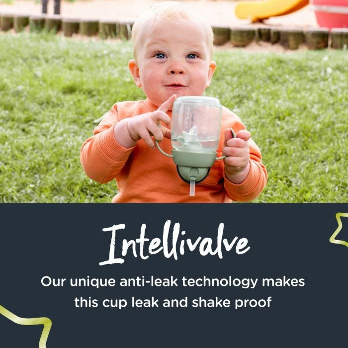 Little boy holding the weighted straw cup upside down with text about the leaf-proof Intellivalve