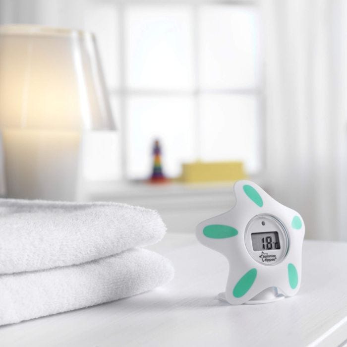 bath-and-room-thermometer-standing-on-ledge-in-bathroom