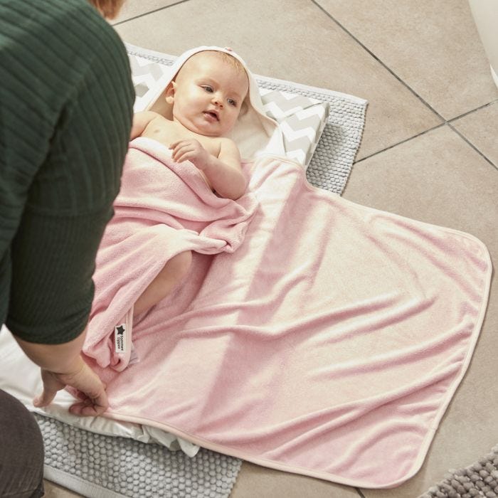 baby about to be wrapped by mum with Splashtime hug ‘n’ dry hooded towel 