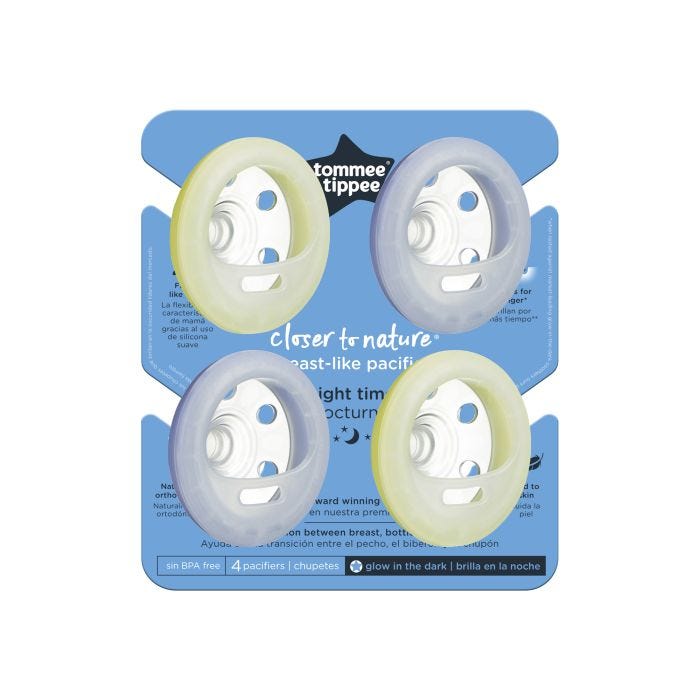 Pacifiers in packaging on a white background