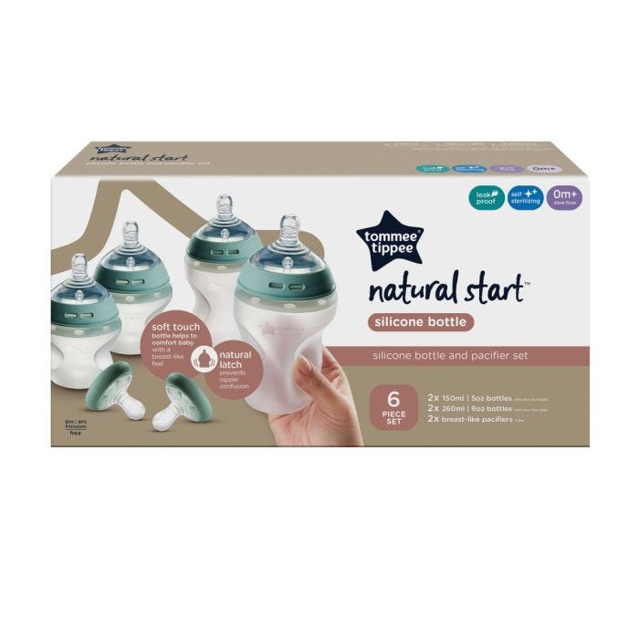 Natural Start Silicone baby bottles and Breast-Like soothers in their packaging box against a white background