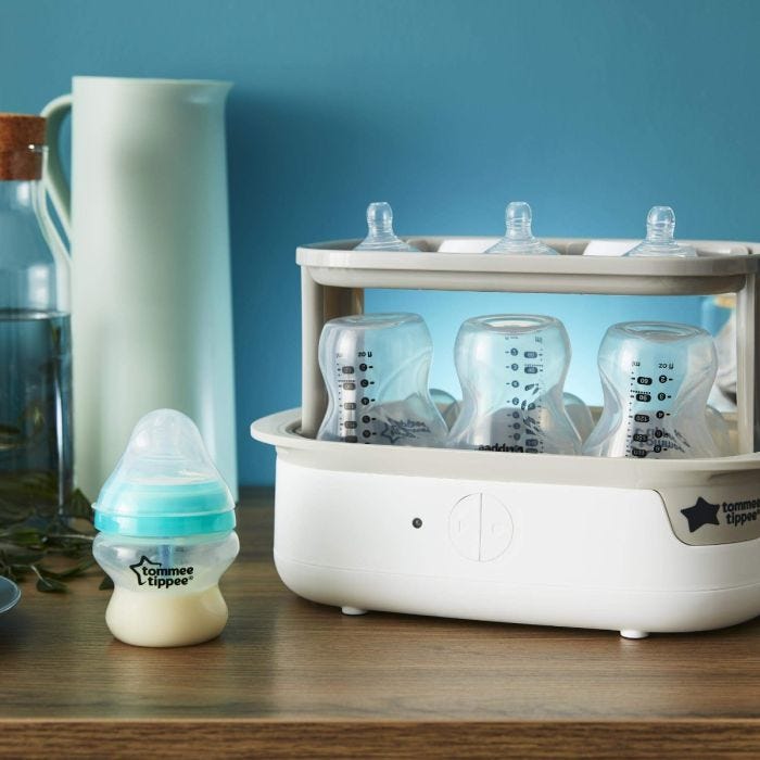 white-Super-steam-Advanced-Electric-Steriliser-with-three-closer-to-nature-baby-bottles-and-three-teats-loaded-ready-to-be-cleaned