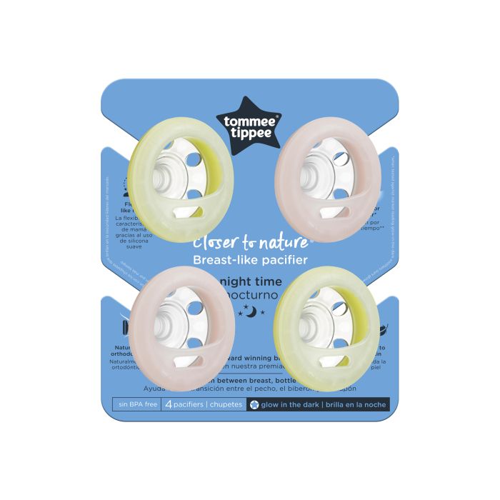 Pacifiers in packaging on a white background