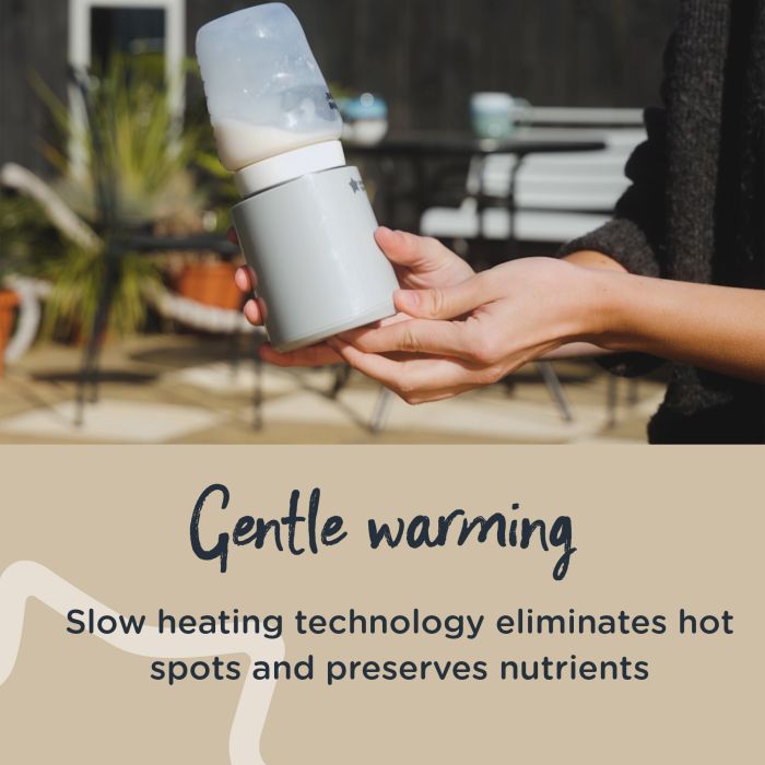 Woman holding LetsGo bottle warmer with upside down baby bottle on top with text about gentle warming