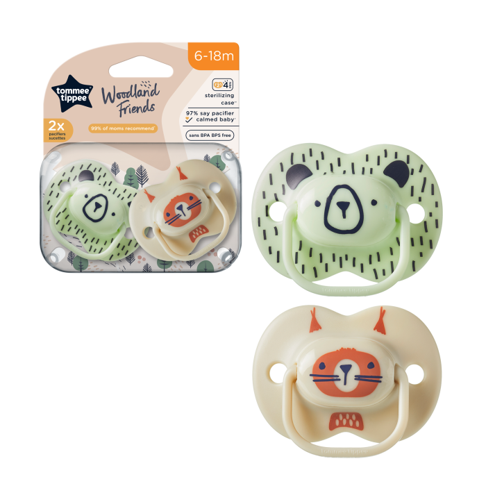 pacifiers in packaging on a white background
