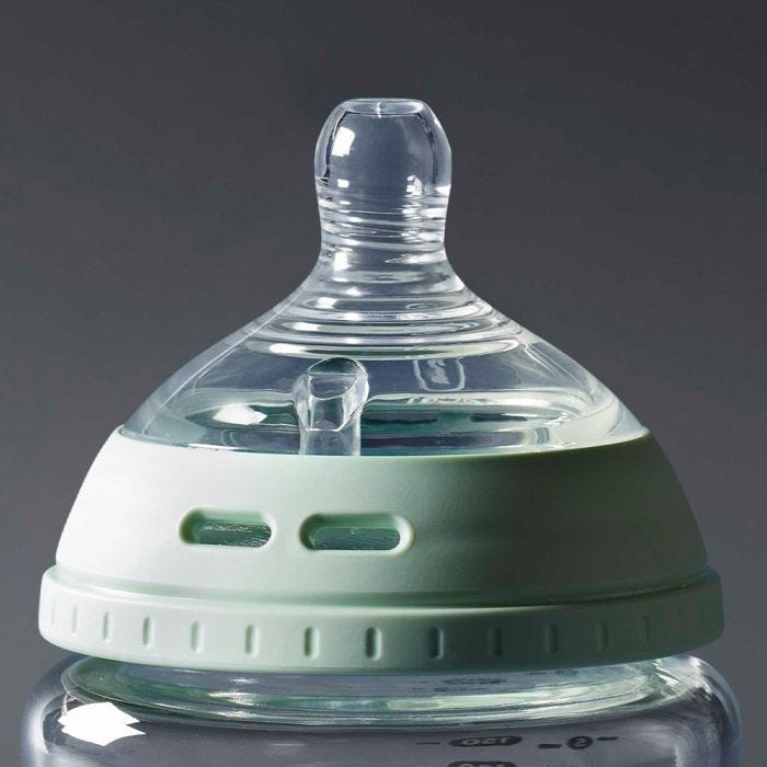 Close up of Glass baby bottle’s sterilising vents and teat