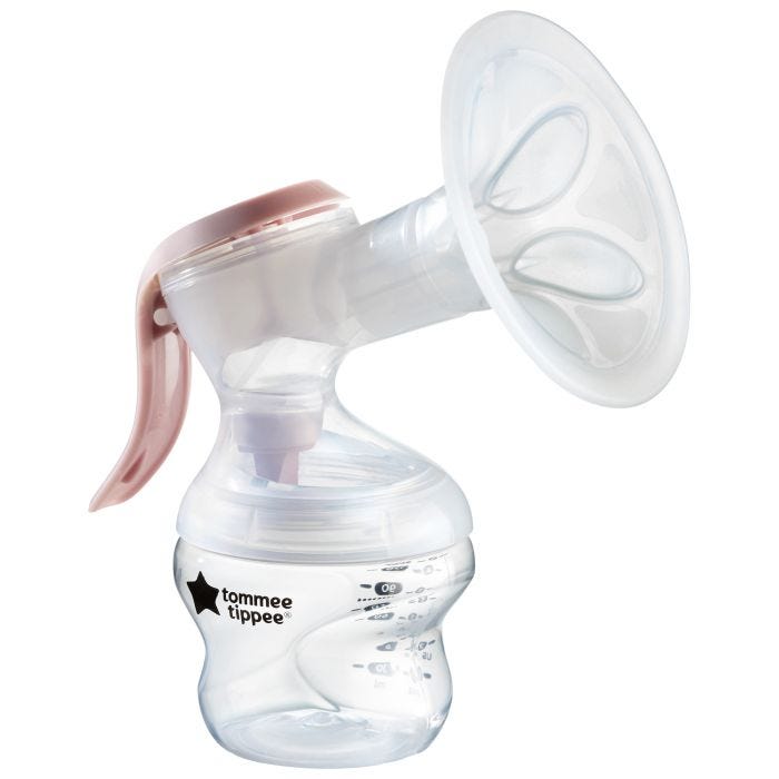 Tommee Tippee Manual Breast Pump with pink ergonomic handle on white background.