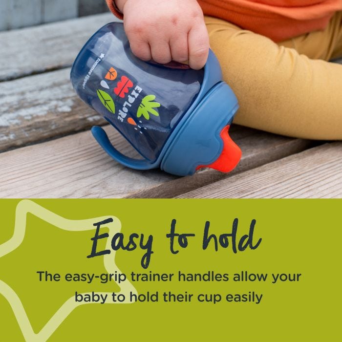 Toddler holding a blue trainer sippee cup with text about how it’s easy to hold