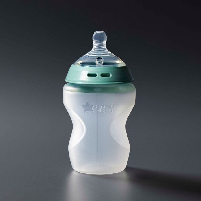 Silicone bottle against a grey background