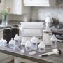 white-Complete-Feeding-Set-on-kitchen-bench