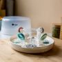 Open microwave sterilizer with multiple soothers inside