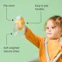 Toddler holding out a trainer straw cup against a green background with pointers to the product key features