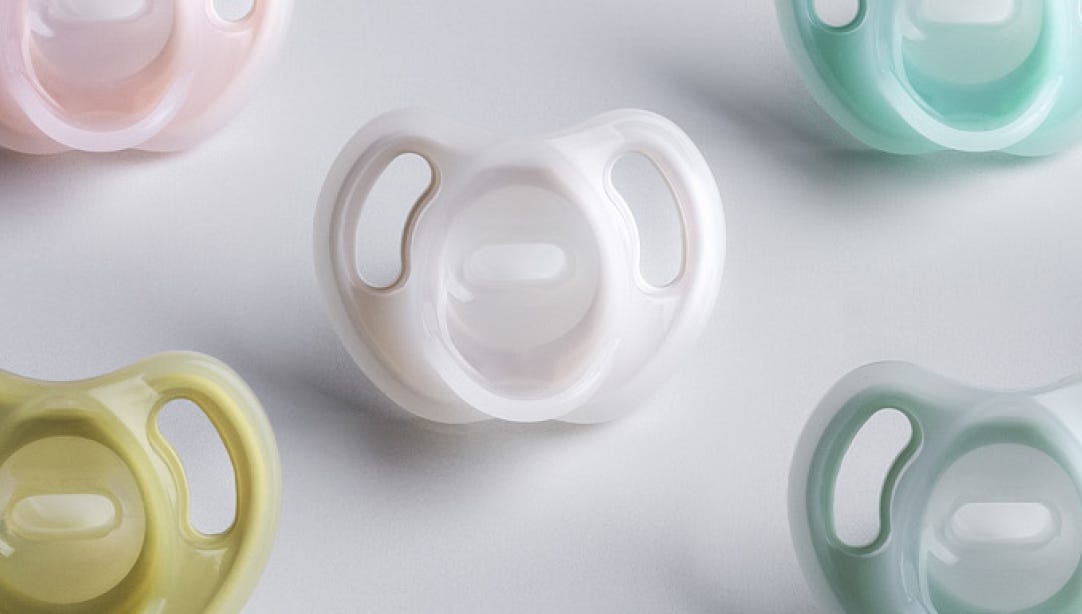 White, Yellow, Blue, Green and Pink Ultra-light soother
